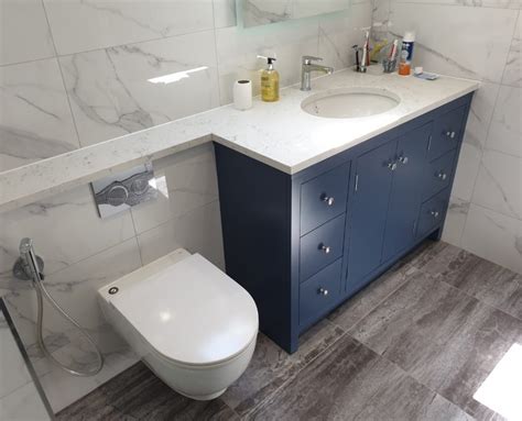https://www.bespokekitchensandfurniture.com/wp-content/uploads/2020/08/Painted-Bathroom-Vanity-Unit-With-Solid-Oak-Draws-3-845x684.jpg?utm_source=chatgpt.com