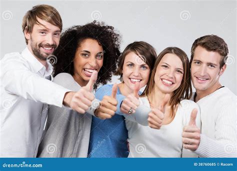Enthusiastic Group Of People Giving A Thumbs Up Royalty Free Stock ...