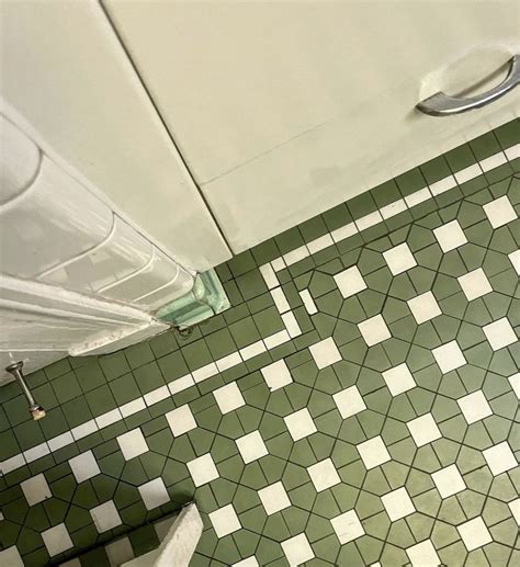 Checkerboard Vinyl Flooring for a Classic Bathroom Look