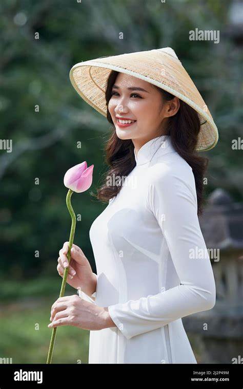 Ho Chi Minh city, Viet Nam: Ao Dai is traditional dress of vietnam, beautiful vietnamese woman ...