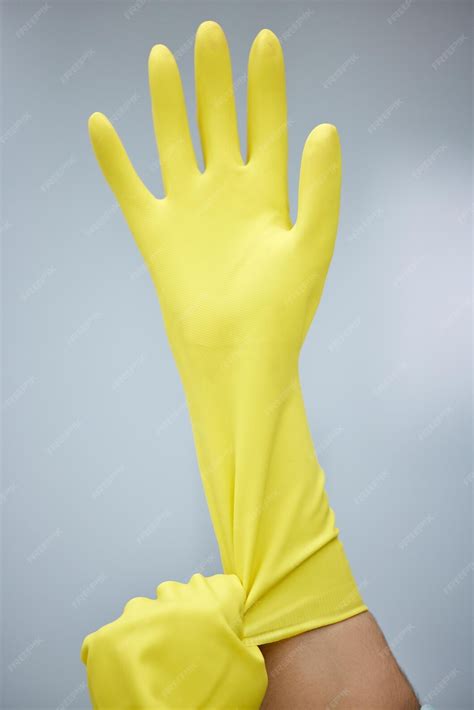 Hands cleaning and rubber gloves for safety or hygiene while indoor for ...