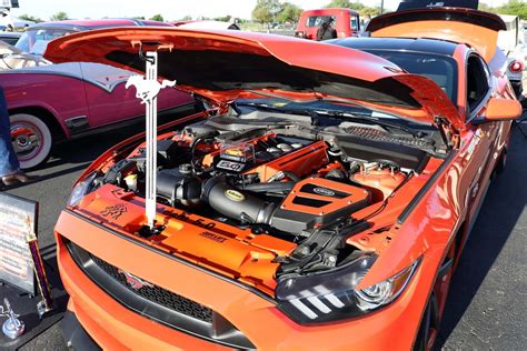 Download Sleek Car Hood Design Wallpaper | Wallpapers.com