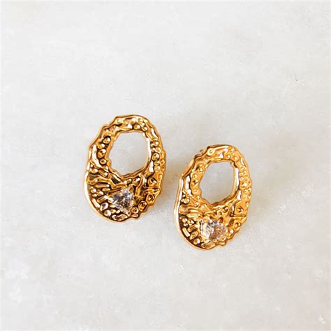 Buy Textured Gold-Tone Oval Stud Earrings with Sparkling CZ Stones for ...