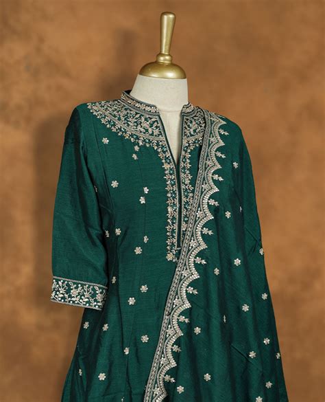 Dark Green colour churidar set featuring thread and embroidered and be