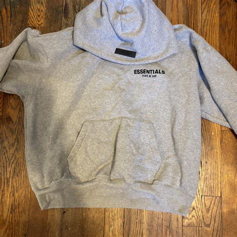 gray essentials hoodie - Depop