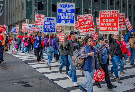 Singing and marching in the streets for CUNY - PSC CUNY