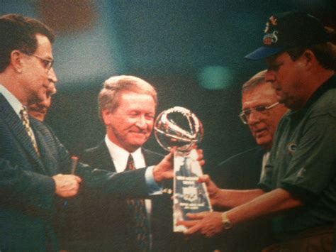 1996 Super Bowl Champion Green Bay Packers. Lombardi trophy being ...