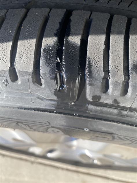 Nail in tire but doesnt seem patchable.. how safe is it to drive and should i just change all my ...
