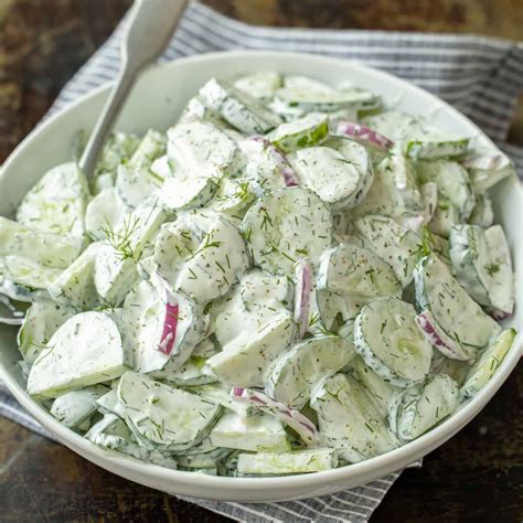 Creamy Cucumber Salad Recipe (VIDEO) - NatashasKitchen.com | Creamy ...