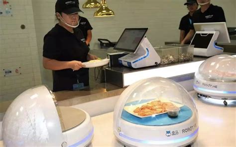 机器人收餐！马云又开了家全智能餐厅！_企业动态_职业餐饮网