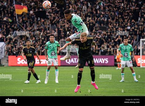 Club León defender William Tesillo (6) wins a header over LAFC ...