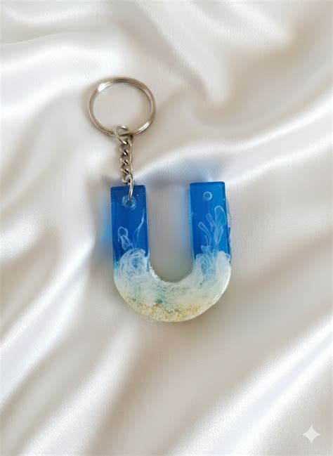Alpha Key Chains & Hand Bag Accessories - Designer – Saffron Blossoms