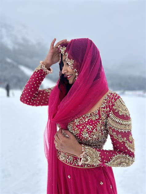 Bride Steffy from Italy in a pink tulle lehenga by Archana Karthick