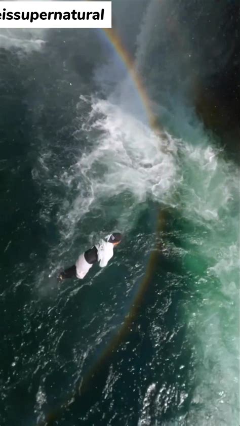Man performs a crazy jump off a cliff . - One News Page VIDEO