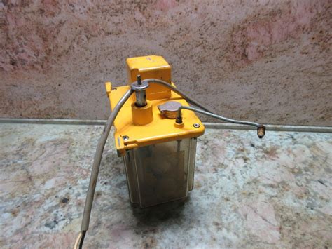 Showa Oilcon Lube Lubrication Tank Pump System | Ubuy India