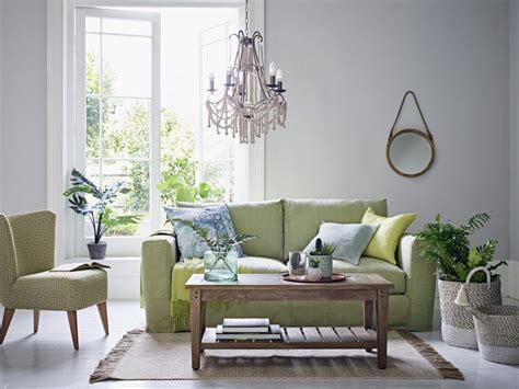 sage green sofa living room