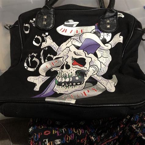 Vintage black Ed Hardy bag/purse, the inside has a... - Depop
