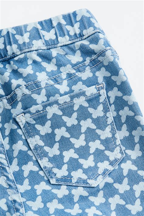 - Flared pull-on jeans - Denim blue/Butterflies - Kids | H&M