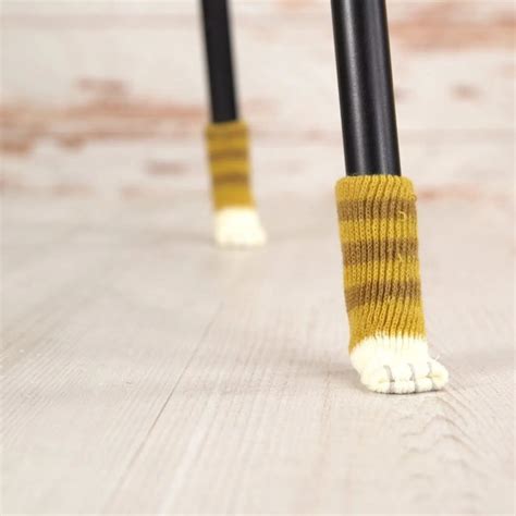 These adorable cat paw socks are pawfect accessory for your furniture ...