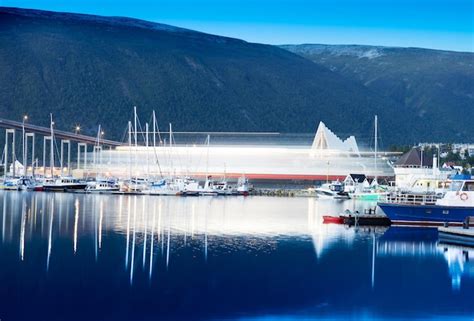 Moving ship under the bridge city background hd | Premium Photo