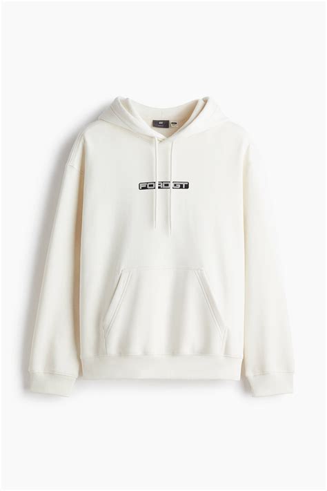 Loose Fit Printed hoodie - White/Ford - Men | H&M IN