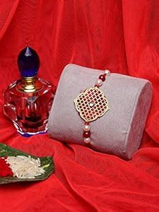 Buy PANASH Gold-Plated Pearl Rakhi With Roli Chawal at Amazon.in