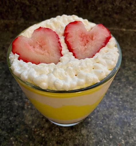 Strawberry yogurt and lemon curd parfait with strawberries and whipped cream. I’m not counting ...