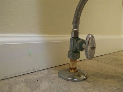 Replace Toilet Tank Supply Line - dismantle the toilet