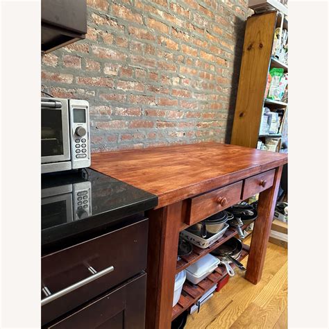 Wayfair Kitchen Island with Storage - AptDeco