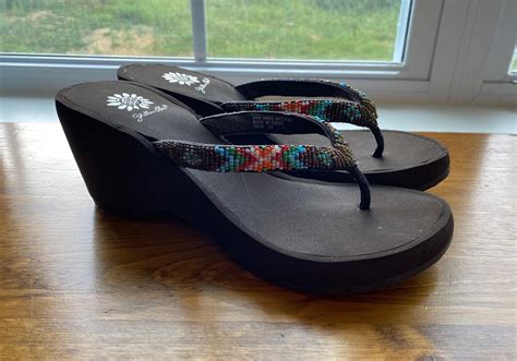 Yellow Box Shoes Logo