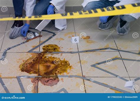 Forensic Technicians Taking DNA Sample from Blood Stain with Cotton ...