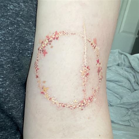 i got malenia’s great rune stabbed into my skin… just took off the ...