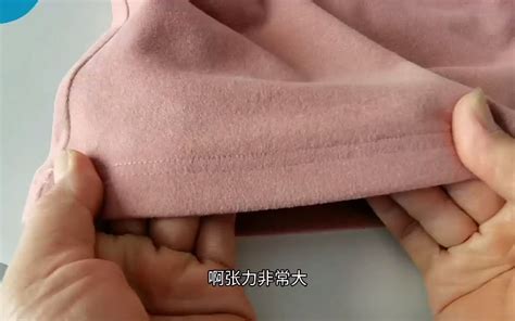 一位专业的女裁缝缝制布料。一个妇女在缝纫机上工作视频素材_ID:VCG42N1353155719-VCG.COM