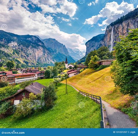 Sunny Summer View of Great Waterfall in Lauterbrunnen Village. Splendid ...