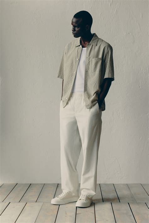 Relaxed Fit Cotton trousers - Cream - Men | H&M IN