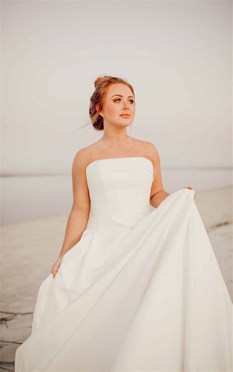 7045 | Stella York | Simple Strapless Wedding Gown with Pockets | True Society Bridal Shops
