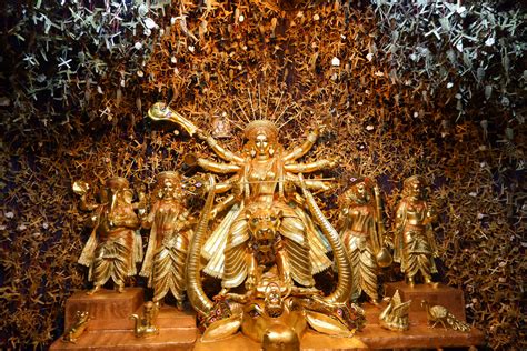 Download Golden Durga Devi Statue Wallpaper | Wallpapers.com