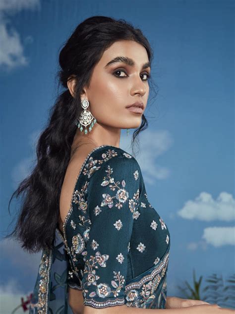 Shop Teal Blue Floral Brasso Engagement Wear Saree From Ethnic Plus