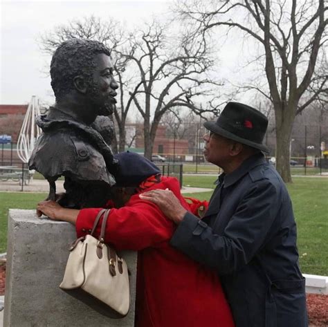 Mr. & Mrs. Hampton right after the unveiling of their son Chairman Fred Hampton bust at Maywood ...