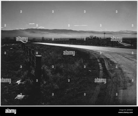 Taos County, New Mexico. Mist in Taos Valley in the morning. Highway ...