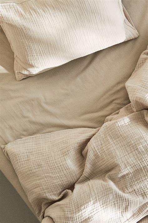 Fitted cotton sheet - Light beige - Home All | H&M IN