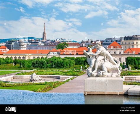 View with a statue in the gardens of Belvedere Palace (Schloss ...