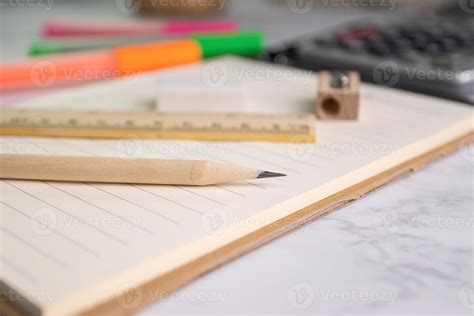 close up a pencil on paper with eraser ruler pencil sharpener on background 13115899 Stock Photo ...