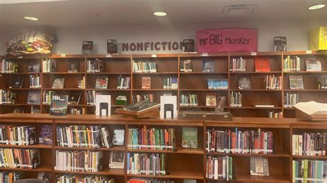 Photo shows school library in St. Johns County with few books ...