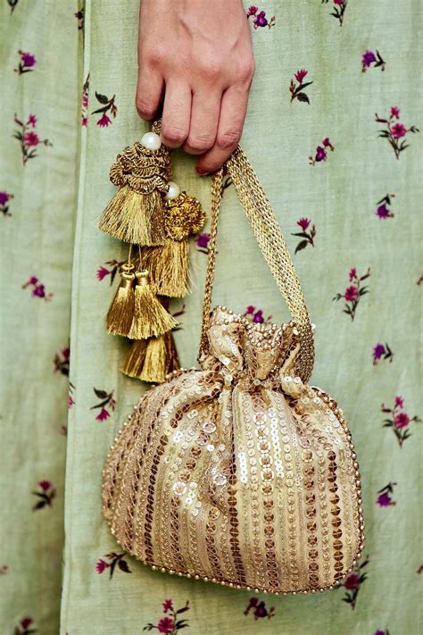 Buy AMYRA Antique Gold Sequin Potli Bag online - The AMYRA Store