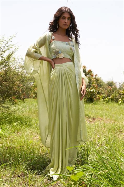 Buy Parshya green top cape jacket and draped skirt set at Aza Fashions ...