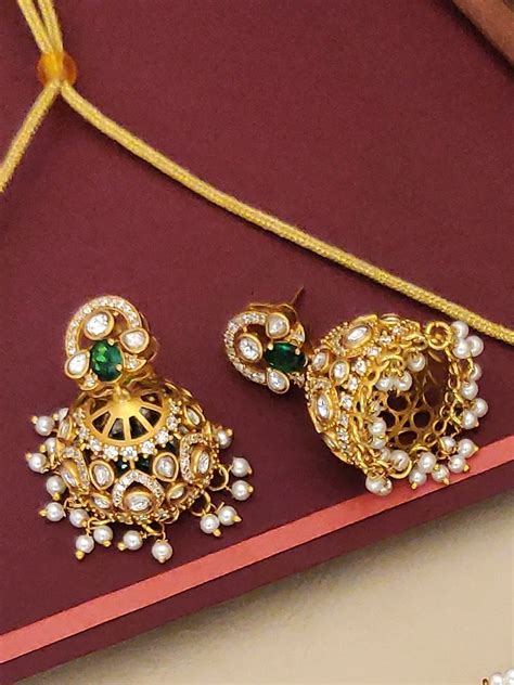 Gold Plated American Diamond Necklace Set featuring intricate designs ...