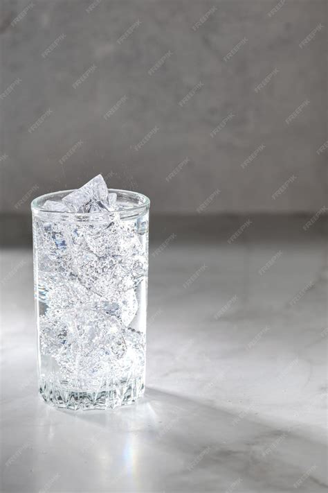 Premium Photo | Glass of mineral water with ice