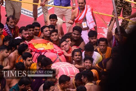 Ratha Yatra Feature Photo Devotees participate in the t...
