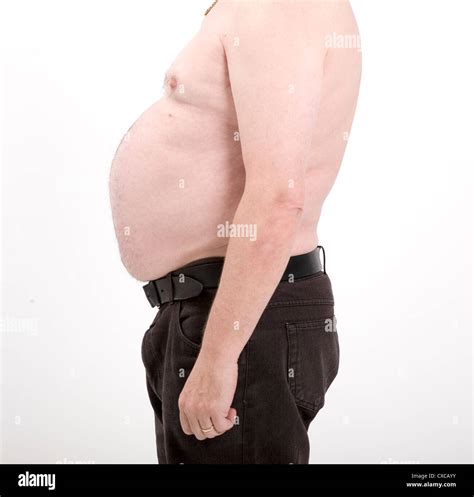 Man with beer belly stripped to waist Stock Photo - Alamy